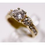 14 ct yellow gold three stone CZ ring,