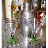 Silver plated cocktail shaker and a pair of green footed cocktail glasses