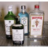 Four bottles of mixed gin including Gordons, Bombay Sapphire and Beefeater,