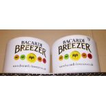Two Bacardi Breezer ice buckets