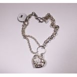 Silver fancy bracelet with heart pendant