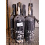 Four bottles Fonseca Guimaerens 1964 vintage port two bottles are leaking others are sealed