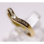 18 ct yellow gold diamond channel set wishbone ring,