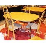 Modern beech effect dining table with chromed steel legs and matching set of four dining chairs