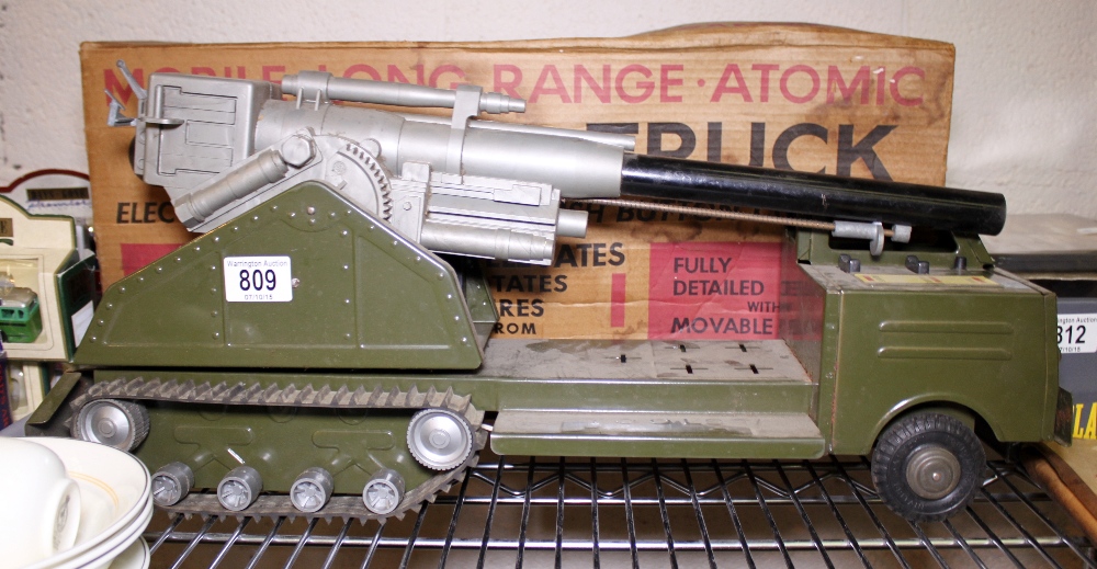 Louis Marx atomic cannon truck electrically operated in box lacking missiles