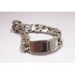 Silver bark effect gents identity bracelet with vacant cartouche.