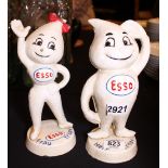 Cast iron Esso man and woman money boxes