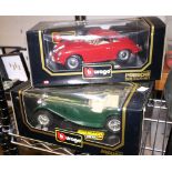 Three Burago 1/18 model cars, Bugatti, Jaguar and Porsche,