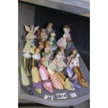 Tray of mixed ceramic figurines including single ornamental court shoes