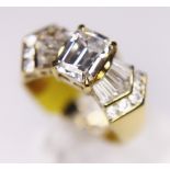 EMERALD CUT RING.