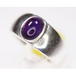 PURPLE CABOCHON RING.