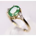 EMERALD AND DIAMOND RING.