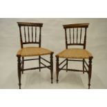 A set of six rosewood chairs with reeded seats. Est. £40 - £50.