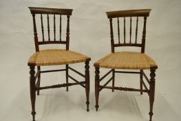 A set of six rosewood chairs with reeded seats. Est. £40 - £50.