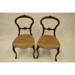 A set of six Victorian hoop back chairs with scroll decoration. Est. £80 - £100.