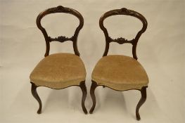 A set of six Victorian hoop back chairs with scroll decoration. Est. £80 - £100.