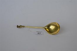 A silver gilt apostle top spoon. London 1890. By GG. Est. £20 - £30.