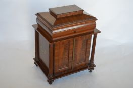 An attractive mahogany lady's stationery box with four fitted drawers with panelled doors, reeded