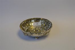 A Continental strawberry dish embossed with flowers and fruit on ball feet. Approx.203 grams. Est £