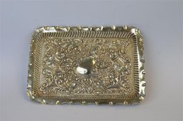 An attractive rectangular dressing table tray with crimped rim and embossed decoration. Birmingham