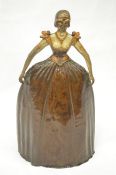 A fire screen in the form of a lady with large dress. Est. £20 - £30.