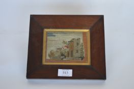 A rosewood framed woolwork tapestry of a castle. Est. £10 - £15.