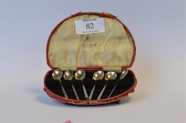 A set of six miniature coffee spoons. Sheffield Mod. By JD & S. Est. £20 - £30.