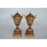 A pair of attractive Vienna vases and covers with gilded decoration and figures. Signed to base.