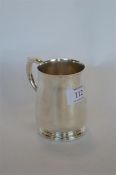 A good quality tankard on pedestal base with plain handle and ball thumb piece. London 1964. By