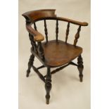 A good oak turned smokers chair. Est. £60 - £80.