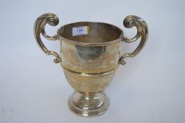A large two handled trophy cup with tapered body. Engraved, "The Royal Air Force Challenge Cup
