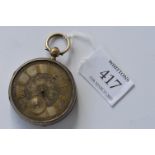 A gent's silver open face pocket watch with silver dial and engraved scrolls to back. Est. £35 - £