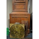 A pine grandfather clock on bracket feet with brass dial. Est. £200 - £250.