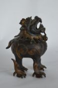 An 18th Century Chinese bronze Qilin incense burner. Est. £250 - £300.