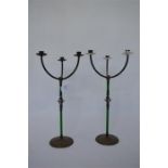 An attractive pair of green glass mounted Art Nouveau three branch candleabra, the central section