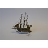 A Continental model of a galleon. Approx 95 grams. Est. £30 - £40.