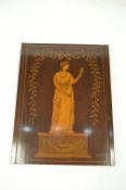 An attractive wooden panel inlaid with lady with floral dress. Est. £40 - £50.