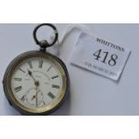 A gent's silver open face pocket watch with subsidiary seconds dial and engine turned back. Est. £35