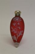 An attractive Webb's cameo red glass scent bottle of teardrop design, decorated either side with