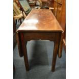 A mahogany heavy two lap table on square tapering supports. Est. £40 - £60.