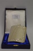 A good quality cased hip flask with bright cut decoration, and screw cap. Birmingham 1967. By CB &