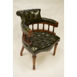 An attractive gent's leather button back chair. Est. £50 - £60.