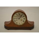 A good Nelson's hat clock with chiming movement and silver dial. Est. £25 - £30.