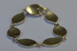 A good Georg Jensen silver six pannelled bracelet with concealed clasp. Numbered 171. Est. £300 - £