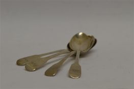 A group of four fiddle pattern dessert spoons. Various dates and makers. Approx 138 grams. Est. £