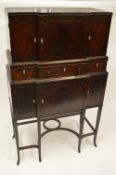 A good Georgian style hall cabinet with inlaid decoration with three drawers and stretcher base.