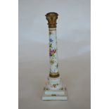 A large Meissen style column decorated with flowers. Est. £70 - £80.