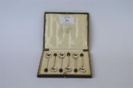 A boxed set of 6 bean topped coffee spoons. Birmingham 1922. By S Ltd. Est. £20 - £30.