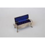 A rectangular hinged topped jewellery casket. Birmingham 1904. Est. £100 - £120.