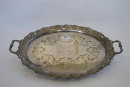 An oval EPNS gallery tray with scroll decoration. Est. £20 - £30.